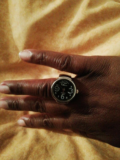 Montre à bague réglable pour homme et femme